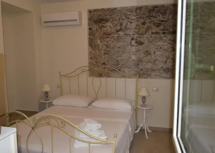 Апартаменты Le Antiche Mura -casa Con Giardino